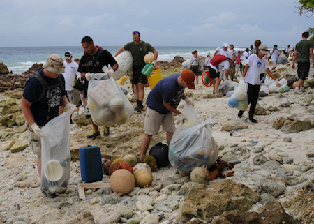 Creative Commons: DIEGO GARCIA (Sept. 14, 2012) Service members and residents of Diego Garcia, British Indian Ocean Territory, clean up trash at Barton Point. More than 130 personnel attended the beach cleanup, assisting in the collection of 4,100 pounds of trash. (U.S. Navy photo by Mass Communication Specialist Seaman Eric A. Pastor/Released) 120914-N-XY761-109 Join the conversation www.facebook.com/USNavy www.twitter.com/USNavy navylive.dodlive.mil